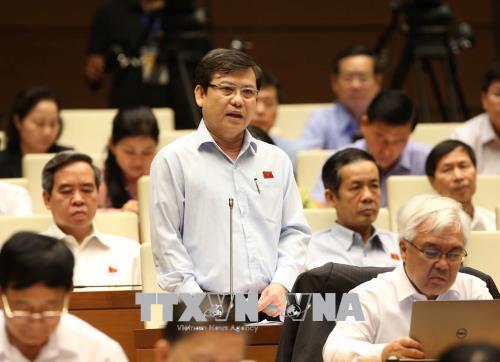 Viện trưởng Viện kiểm sát nhân dân tối cao Lê Minh Trí trả lời các câu hỏi liên quan đến nội dung chất vấn của đại biểu Quốc hội. 