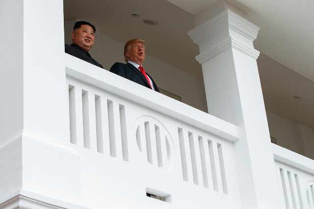 Nhìn lại những khoảnh khắc 'đắt giá' của Hội nghị Thượng đỉnh Mỹ-Triều ảnh 4